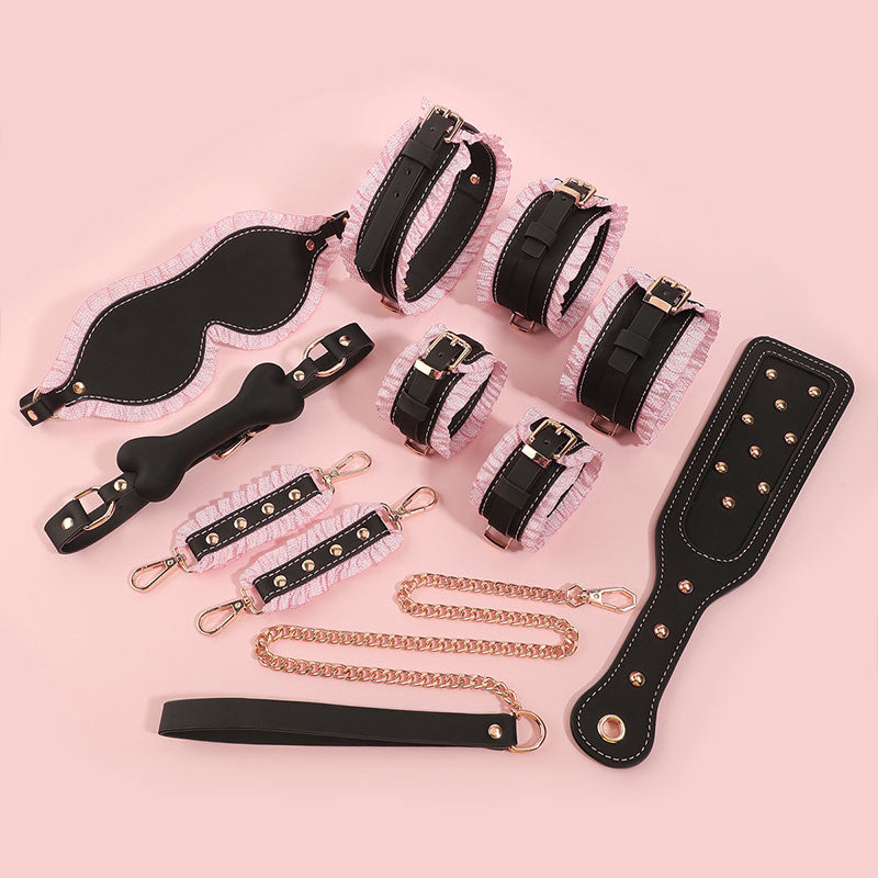Wondebliss 6-piece black and pink lace bondage restraint set, full collection laid flat