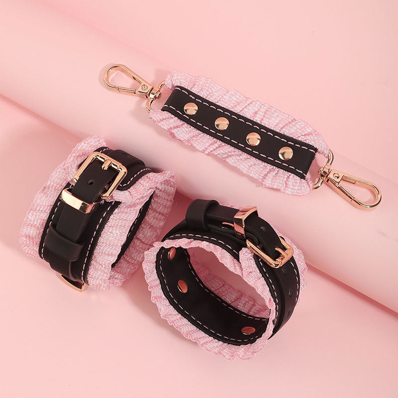 Wondebliss black and pink lace handcuffs with premium hardware from bondage set