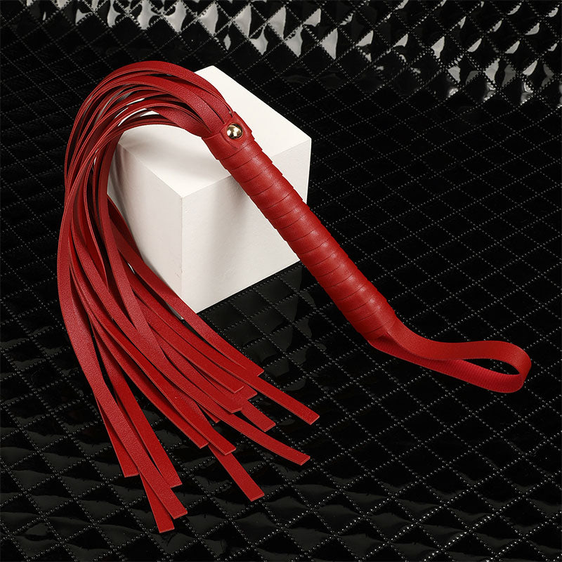 Wondebliss faux leather whip from 7-piece bondage restraint kit