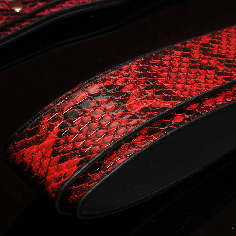 Close-up of realistic snake print pattern on Wondebliss faux leather spanking paddle