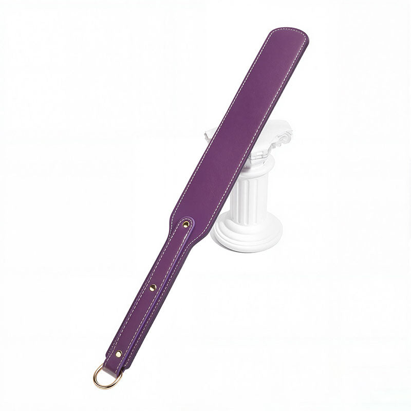 Wondebliss purple faux leather spanking paddle with fine stitching detail