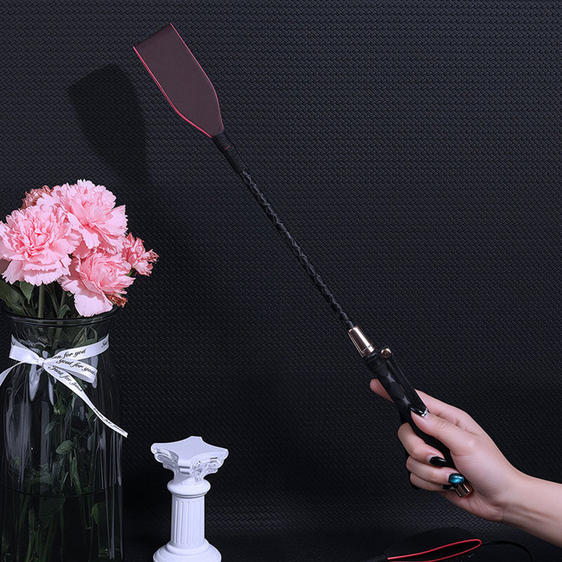Wondebliss heat-sensitive leather spanker hand-held display showing full length and grip