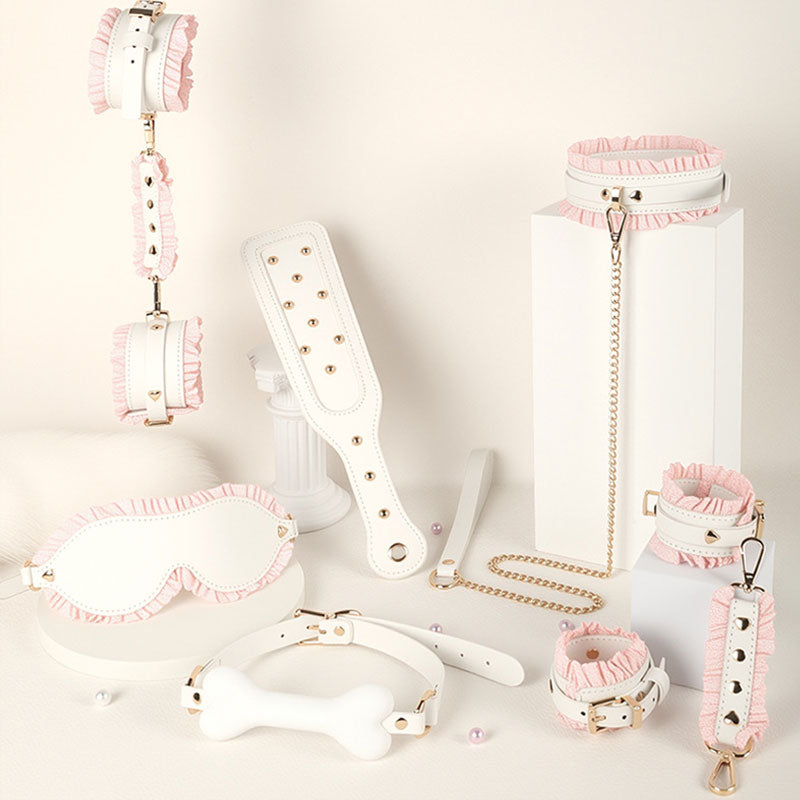 Wondebliss white and pink 6-piece bondage set full collection laid flat